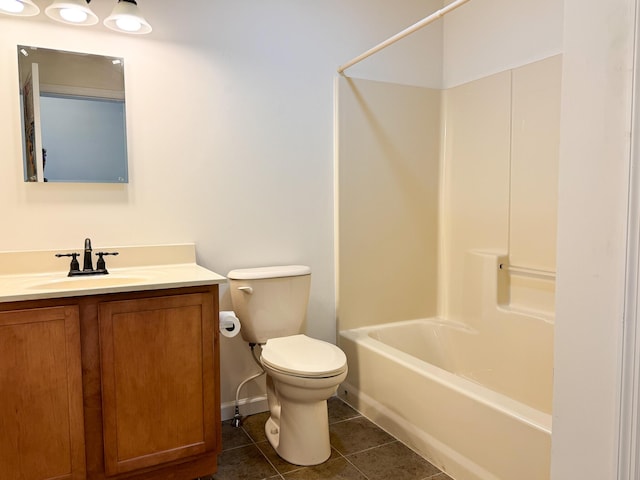 bathroom featuring tile patterned floors, shower / bathtub combination, toilet, and vanity