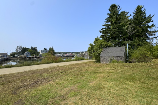 view of yard with a water view
