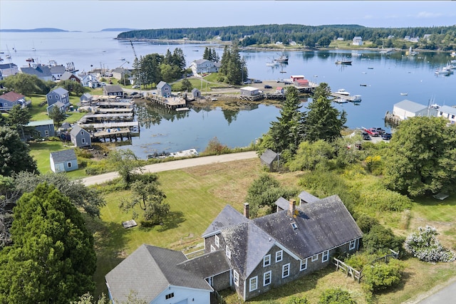 birds eye view of property featuring a water view