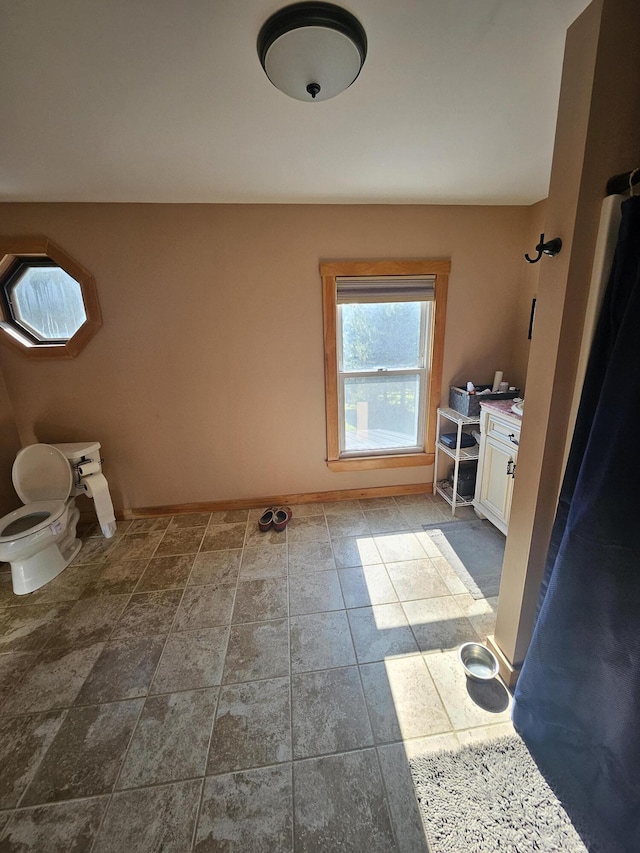 bathroom featuring toilet