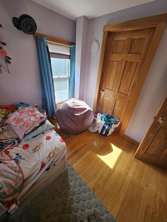 bedroom featuring light wood-type flooring