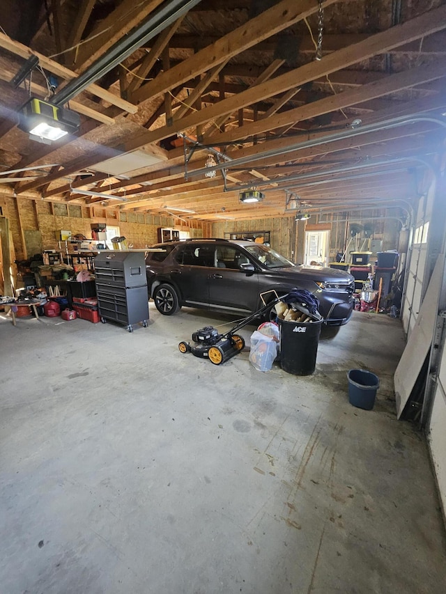 garage featuring a garage door opener