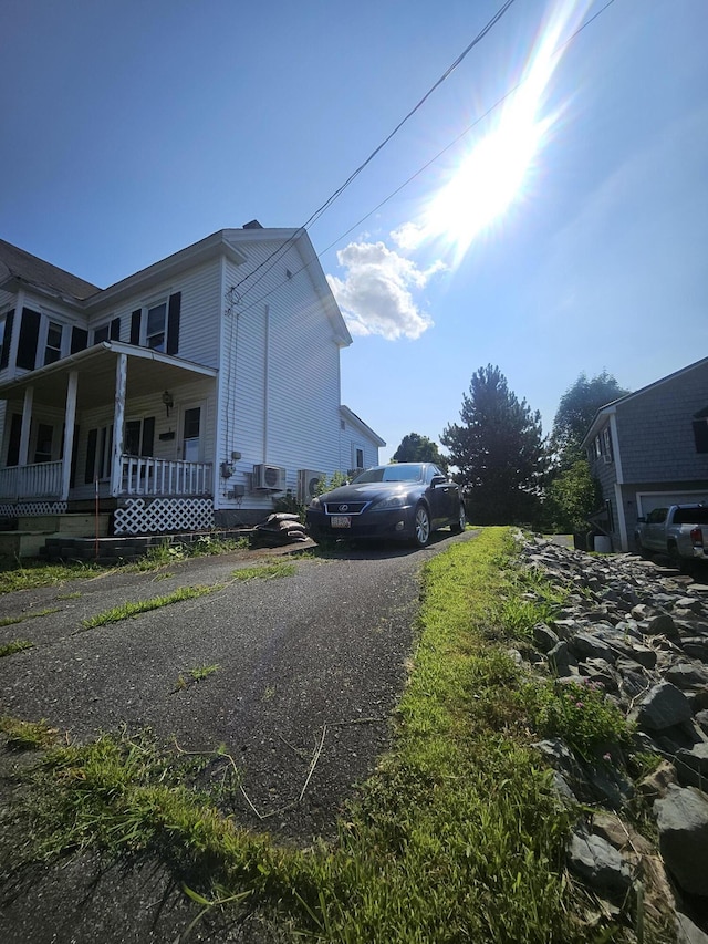 view of home's exterior featuring a porch