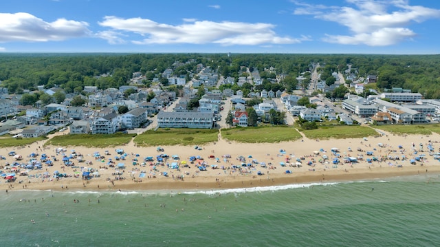 bird's eye view with a water view and a view of the beach