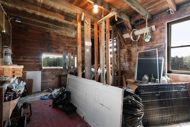 misc room with wooden ceiling and beamed ceiling