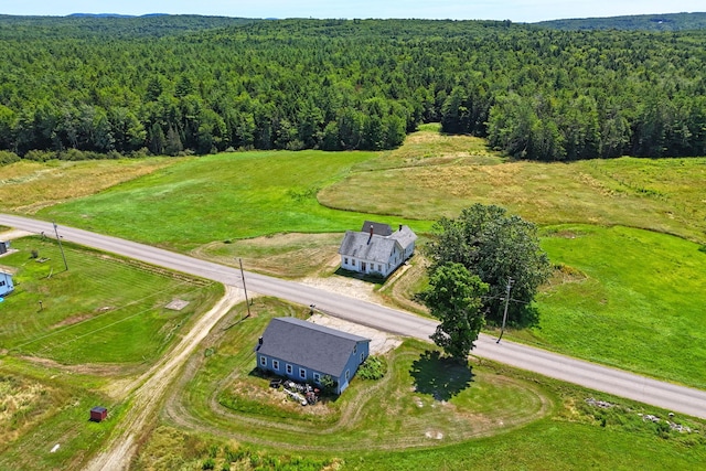 birds eye view of property featuring a rural view