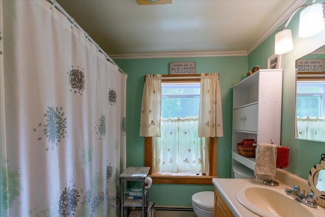 bathroom featuring ornamental molding, toilet, and vanity