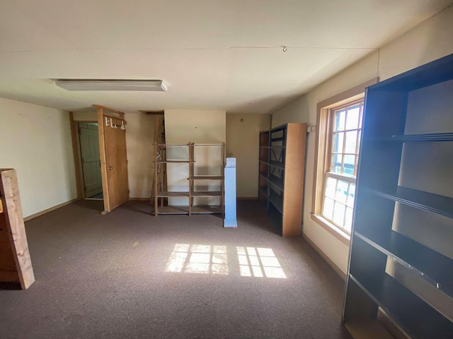 unfurnished bedroom featuring baseboards