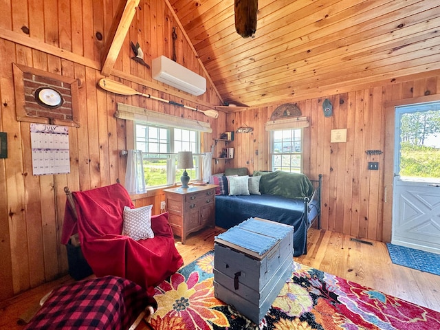 living area with a wall unit AC, wooden ceiling, a wealth of natural light, and wood walls