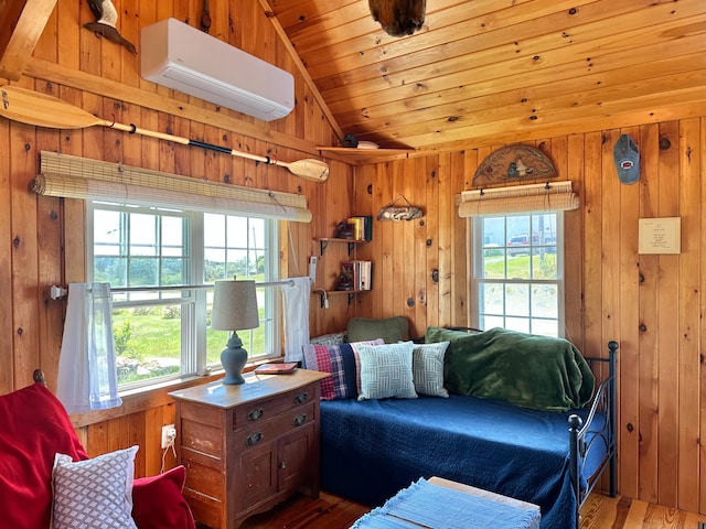 living room featuring wooden walls, wood-type flooring, a wall mounted air conditioner, and vaulted ceiling