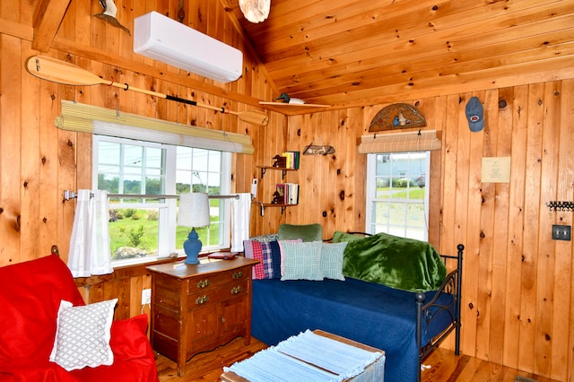 living room with an AC wall unit, wooden walls, lofted ceiling, and hardwood / wood-style floors