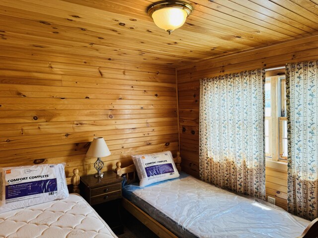 unfurnished bedroom with wooden ceiling