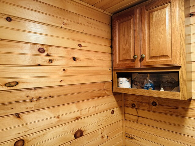 room details with wood ceiling and wooden walls