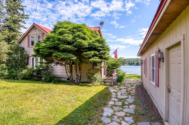 view of yard with a water view