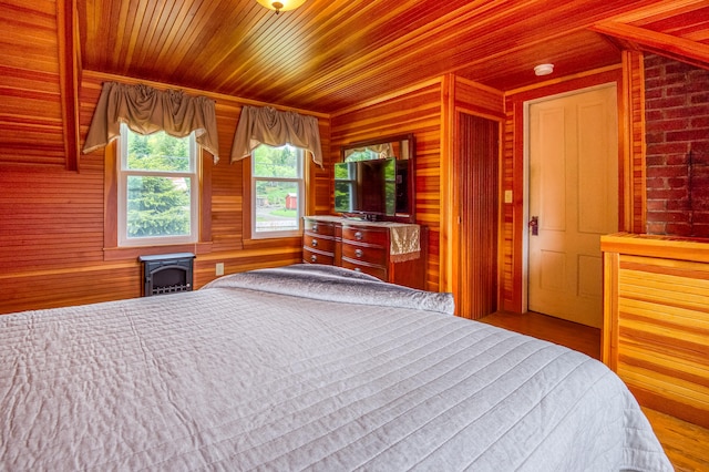 unfurnished bedroom featuring wood walls, wood-type flooring, and wooden ceiling