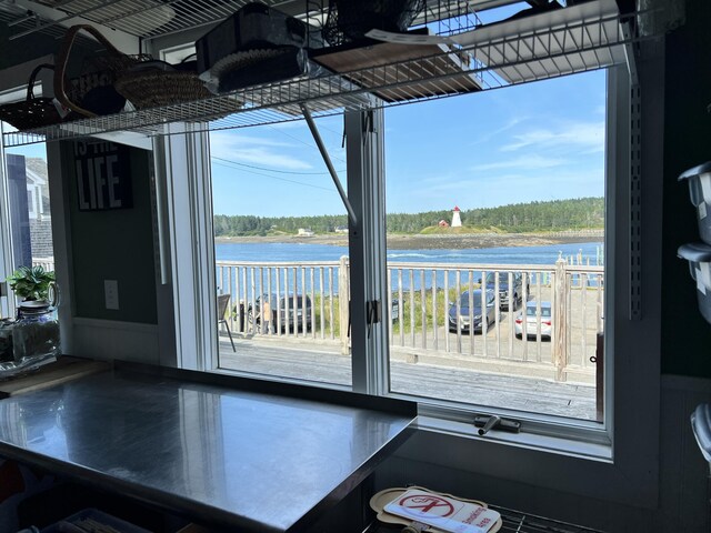 interior space featuring a water view