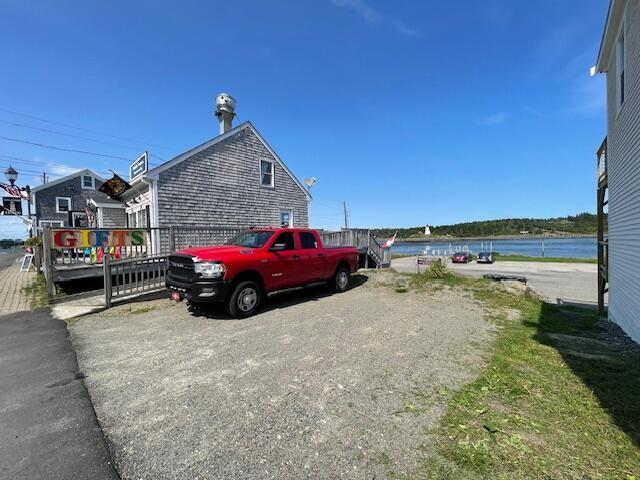 exterior space with a water view