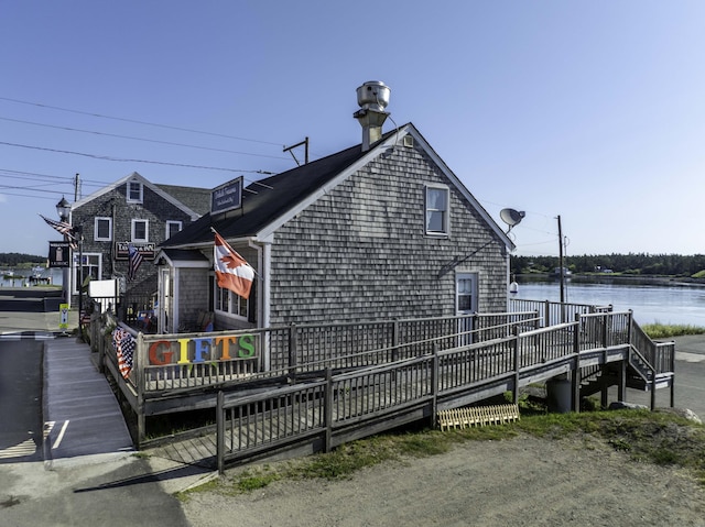 20 Water St Unit 2, Lubec, ME 04652 - back of house featuring a deck with water view