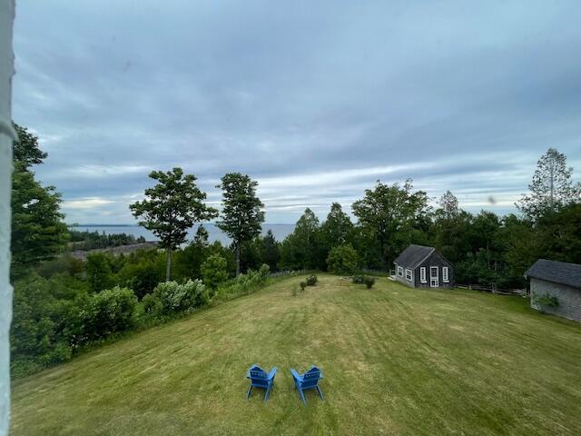 38 Kingsbury Ln, Perry, ME 04667 - view of grassy yard with an outbuilding