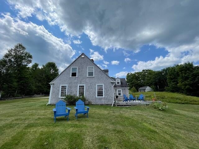 38 Kingsbury Ln, Perry, ME 04667 - back of property featuring a yard and a deck
