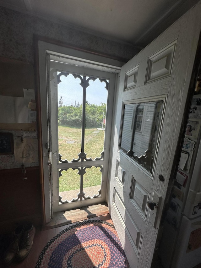 doorway to outside with hardwood / wood-style flooring