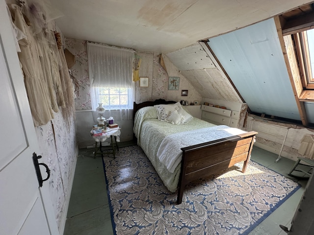 bedroom featuring lofted ceiling