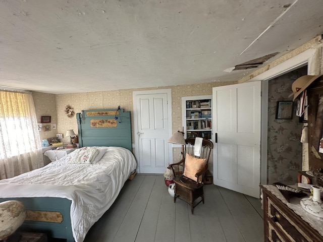 bedroom featuring hardwood / wood-style floors