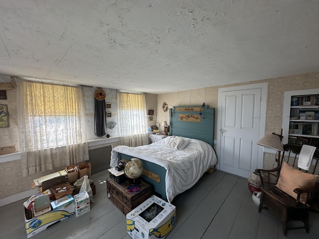 bedroom featuring hardwood / wood-style floors