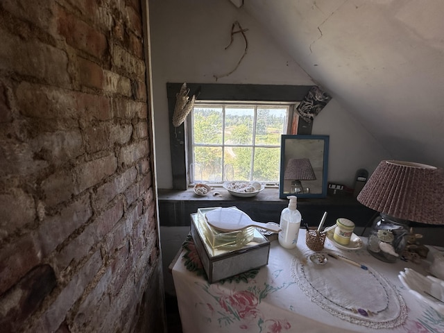 misc room featuring lofted ceiling