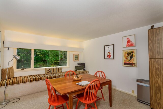 view of carpeted dining room