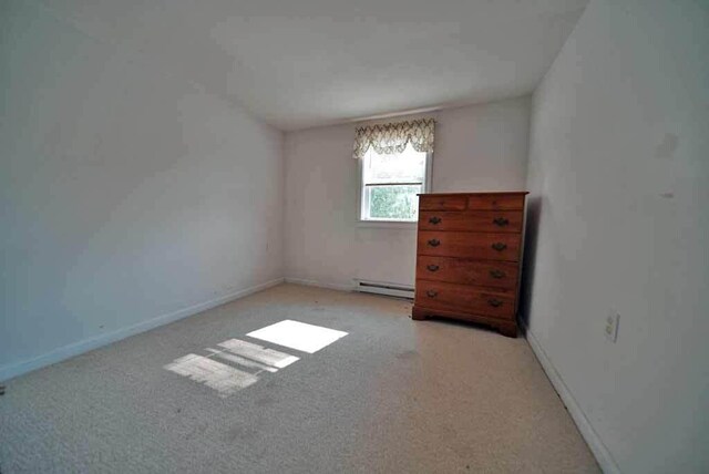 interior space featuring a baseboard radiator