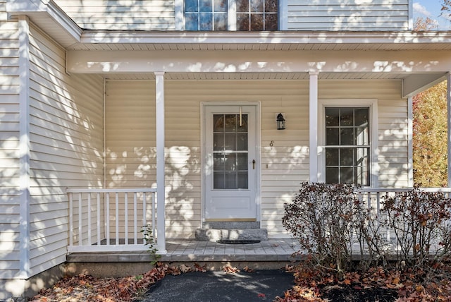 entrance to property with covered porch