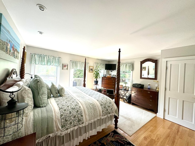 bedroom featuring hardwood / wood-style floors