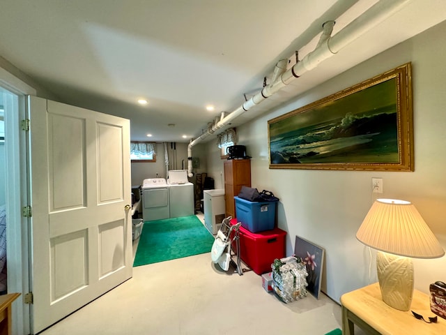 interior space with washing machine and dryer and carpet