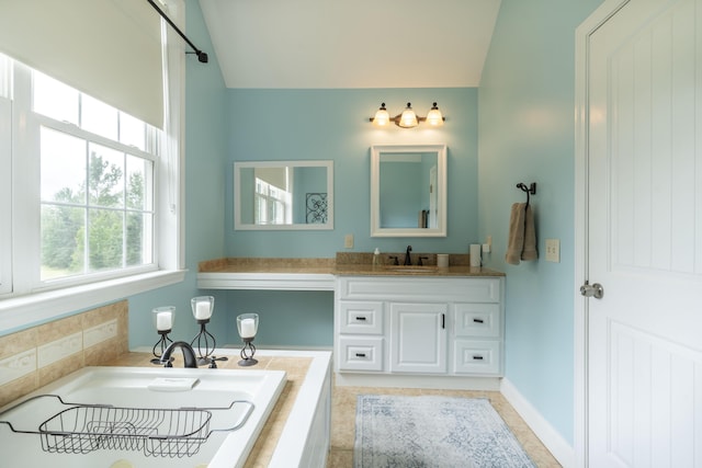 bathroom featuring tile patterned flooring and vanity