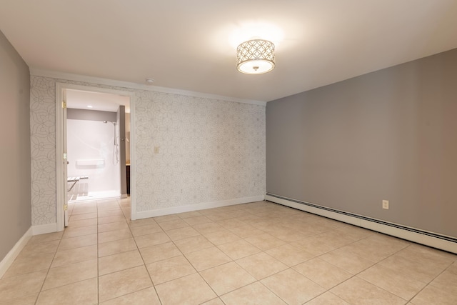 tiled empty room with a baseboard radiator