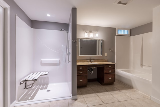 bathroom featuring tile patterned floors and vanity