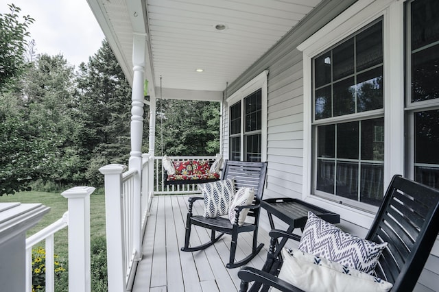 wooden deck featuring a porch