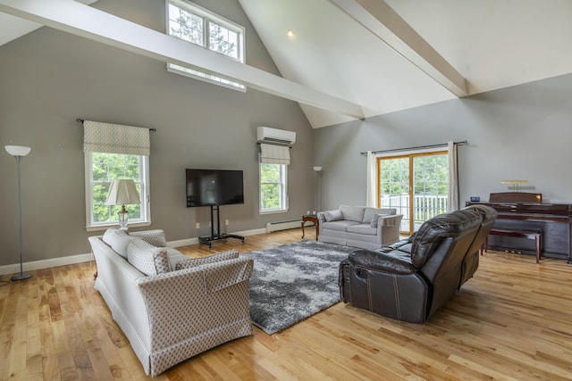 living room featuring a wealth of natural light, a wall unit AC, a baseboard heating unit, and light hardwood / wood-style floors