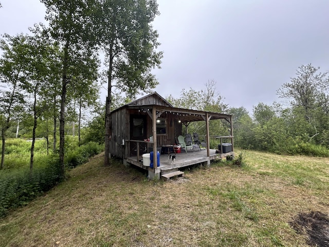 exterior space featuring a wooden deck