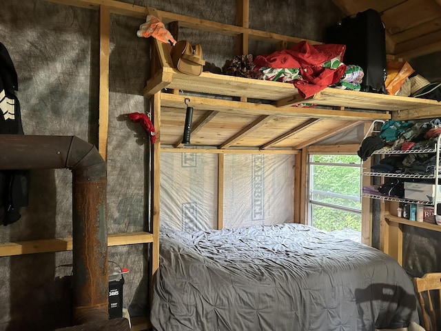 bedroom featuring vaulted ceiling