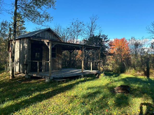 view of yard with a wooden deck