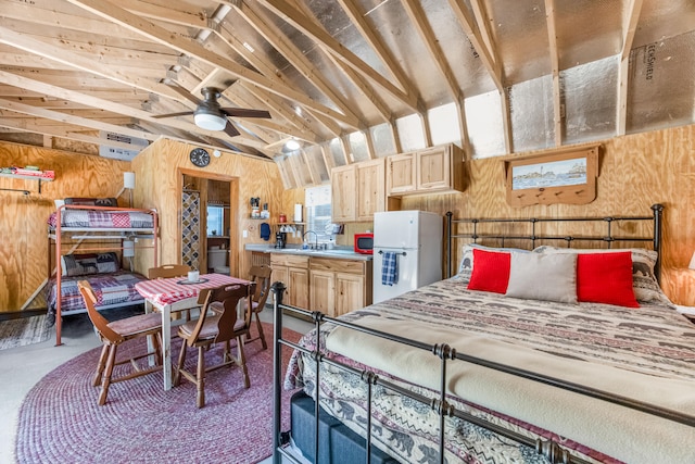 carpeted bedroom with white refrigerator, high vaulted ceiling, wooden walls, beamed ceiling, and sink