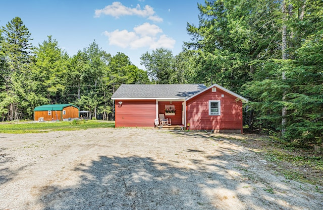 view of front of house with an outbuilding