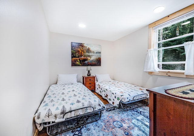 bedroom featuring hardwood / wood-style flooring