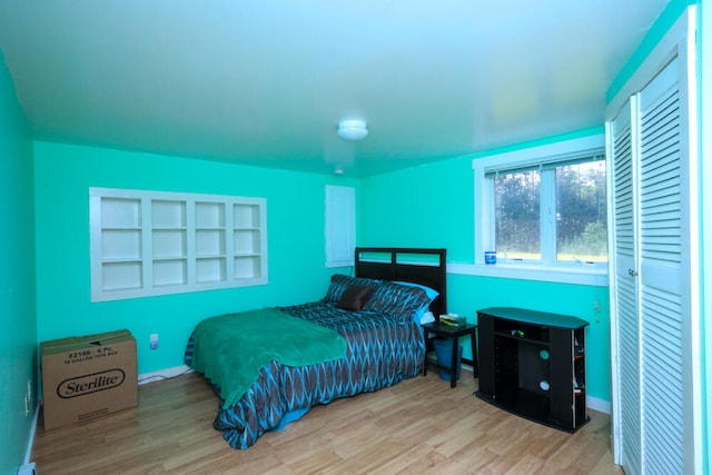 bedroom featuring light wood-type flooring