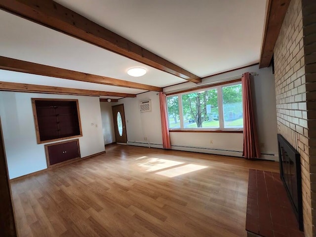 unfurnished living room with light wood-type flooring, beam ceiling, brick wall, and a brick fireplace