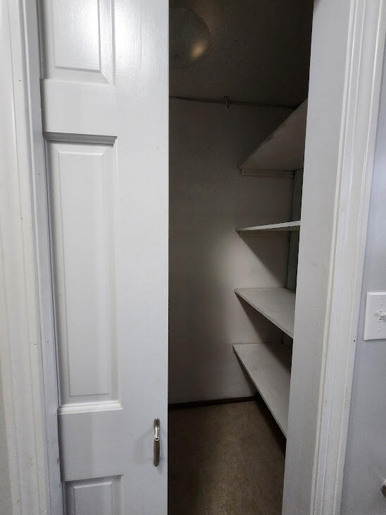 walk in closet featuring tile patterned floors