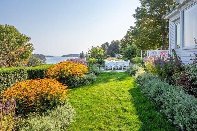 view of yard with a water view