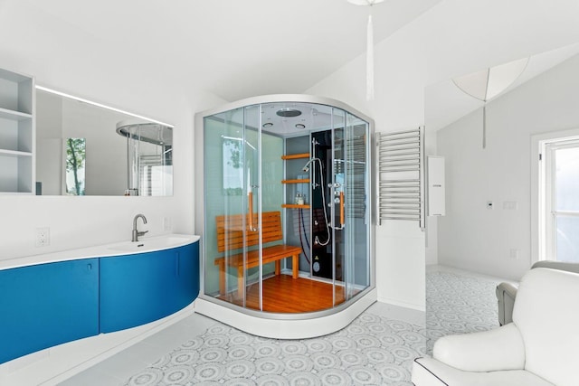 bathroom with tile patterned floors and vanity